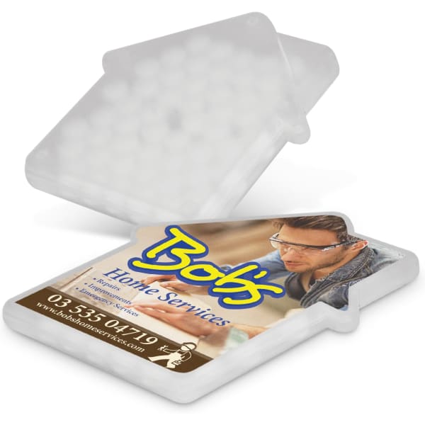 A transparent mint card shaped like a house, featuring small mint candies inside and a branding logo.