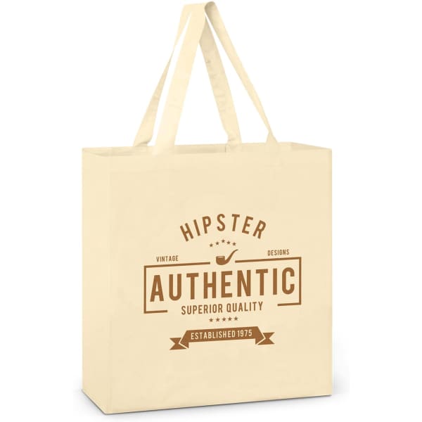 A cream cotton tote bag with long handles and a logo. Features a vintage design theme.