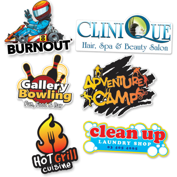 A collection of colourful promotional stickers featuring various designs for businesses, including a go-kart, food, and services.