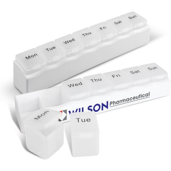 A white medication organiser featuring compartments for each day of the week, with a small logo visible.