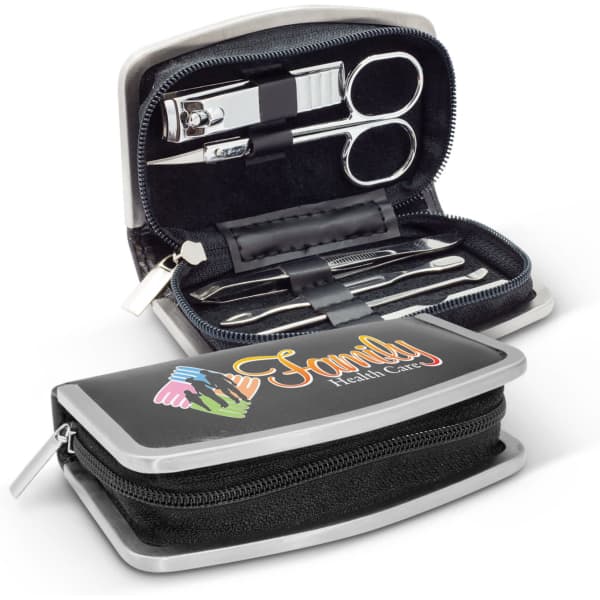 A manicure set in a black and silver case, containing nail clippers, scissors, and grooming tools.