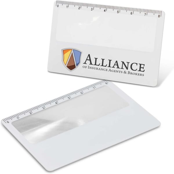 A card magnifier in white with a ruler along the top edge and a logo on one side.