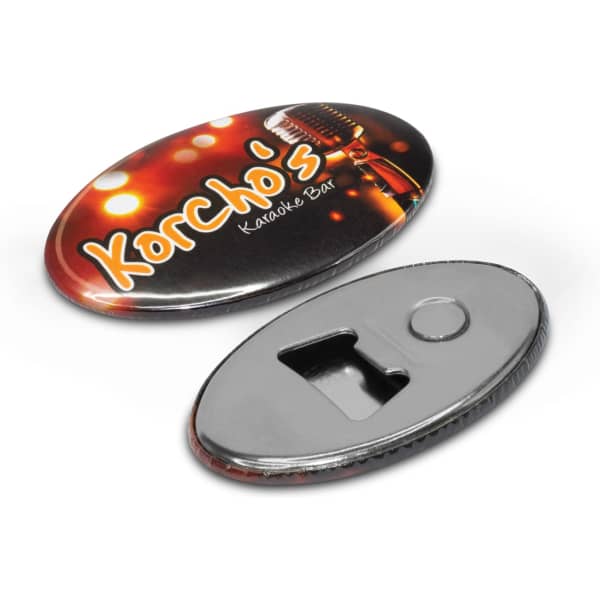 A drink bottle opener in oval shape with a metallic finish, featuring a logo and a black backing.