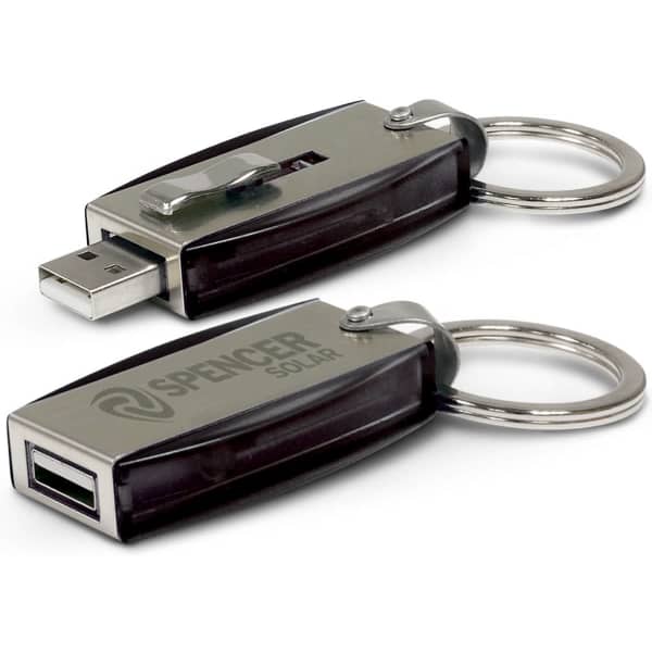 A silver and black key ring flash drive with a USB connector and a keychain attachment, featuring a logo.