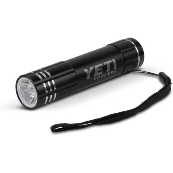 A black flashlight with a wrist strap, featuring a branded logo.