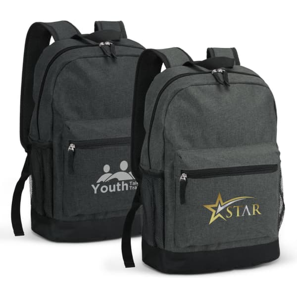 A grey backpack with a front zip pocket and mesh side pockets. It features a logo on one side.