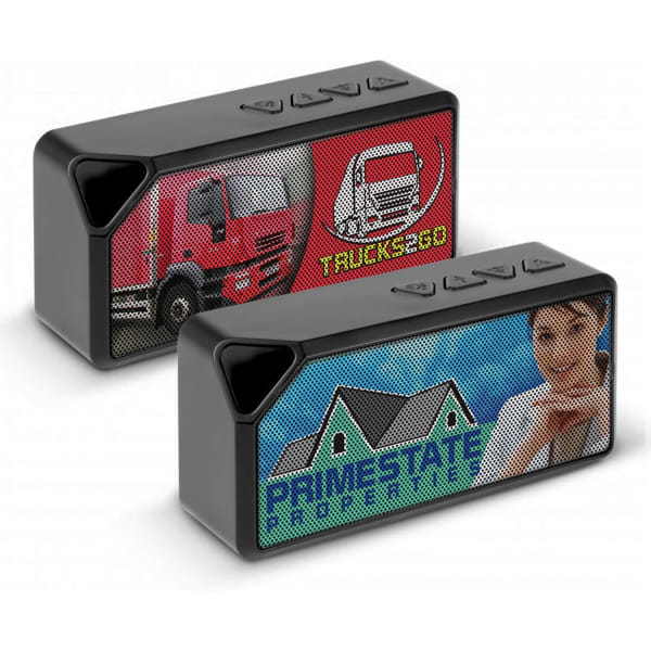 A black Bluetooth speaker with colourful branding on both sides featuring a truck and a house design.