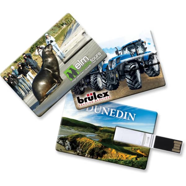 A set of three credit card-sized flash drives featuring various images and a logo, with vibrant colours and designs.