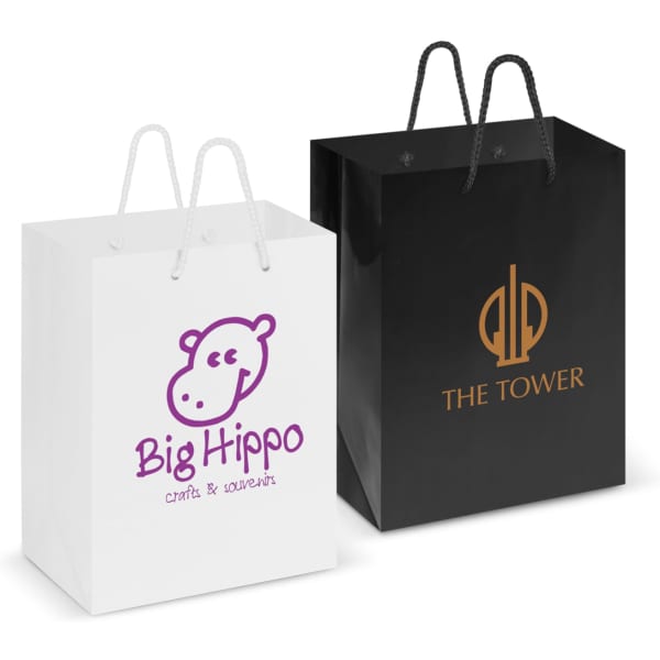 Two laminated carry bags: one white with a purple logo, the other black with a gold logo.