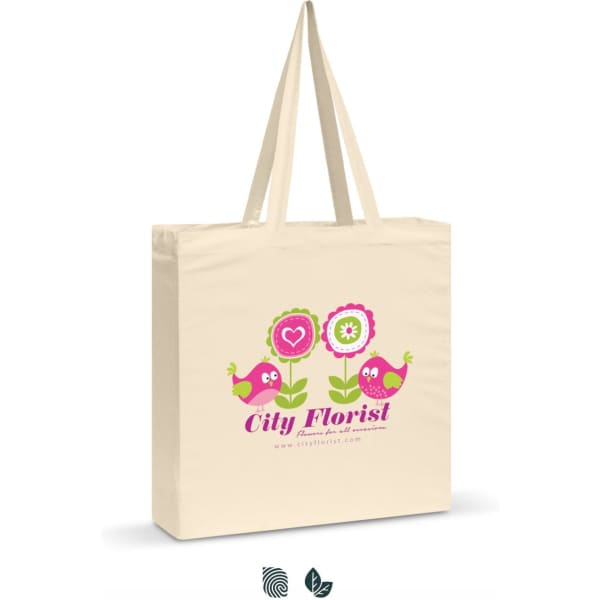 A cream cotton shoulder tote featuring colourful birds and flowers, with a logo on one side.