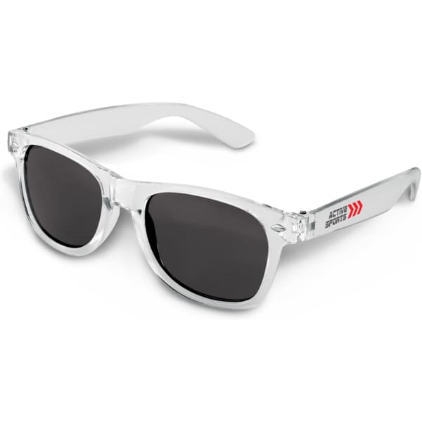 Translucent sunglasses with dark lenses and clear frames, featuring a logo on the side. Ideal for leisure activities.