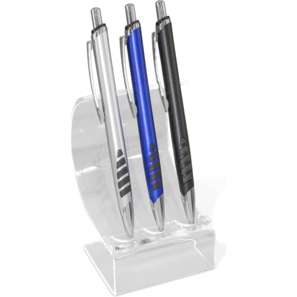 A display stand featuring three pens: silver, blue, and black, set on a clear acrylic holder.