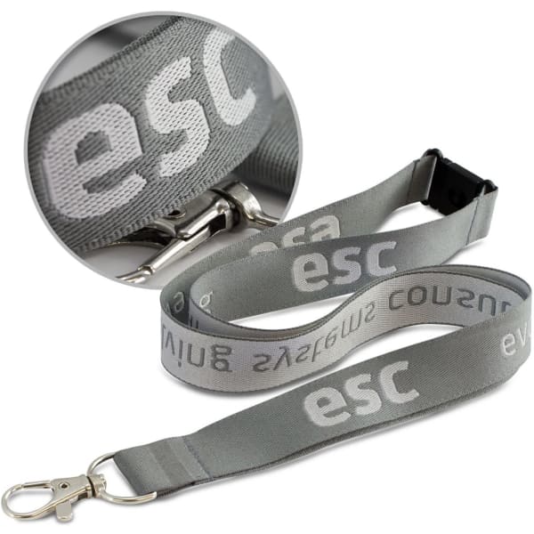 A grey Jacquard lanyard with a clip and branding along its length.