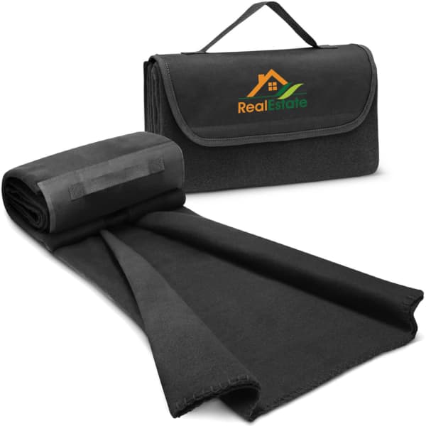 A black fleece blanket folded with a carrying handle, featuring a logo on the front.