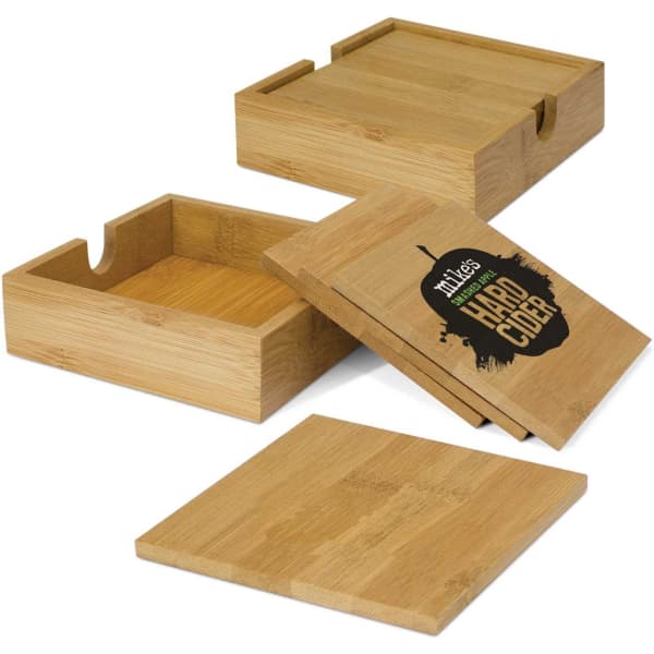 Bamboo coasters in natural tones, featuring a box and lids, with a logo on one of the coasters.