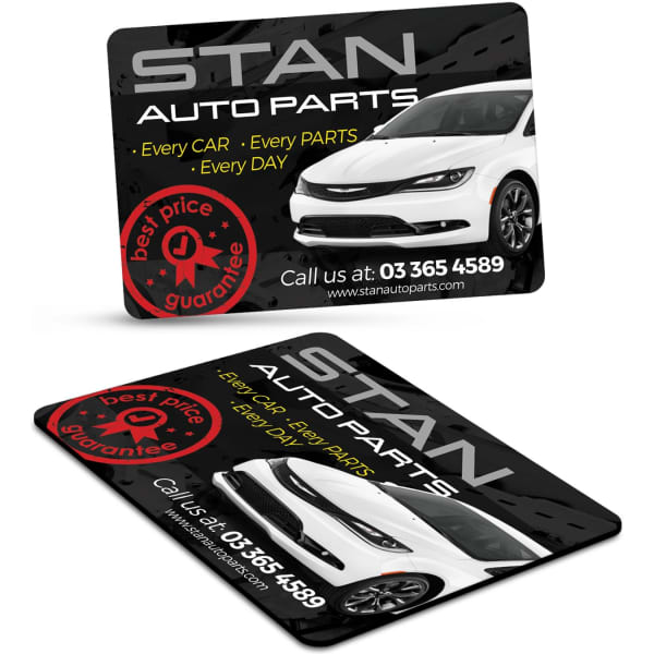 A rectangular fridge magnet featuring a black background and a car image, with a logo and contact details.