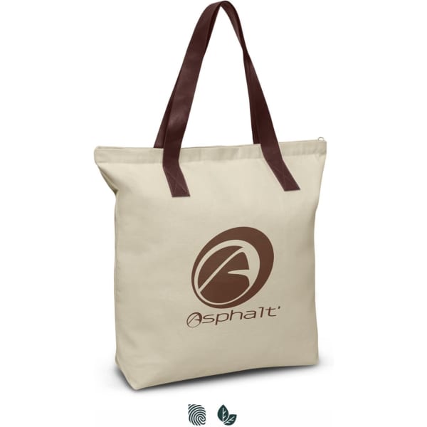 A cream tote bag with brown handles and a logo on the front.