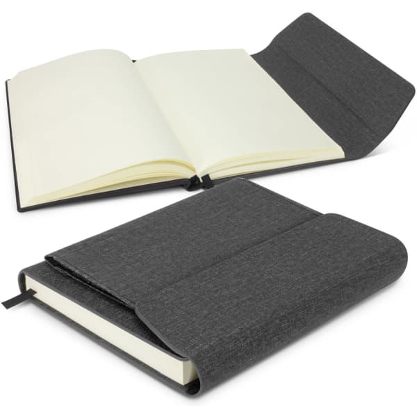 A dark grey notebook with a soft cover, featuring blank pages and an interior flap for storage.
