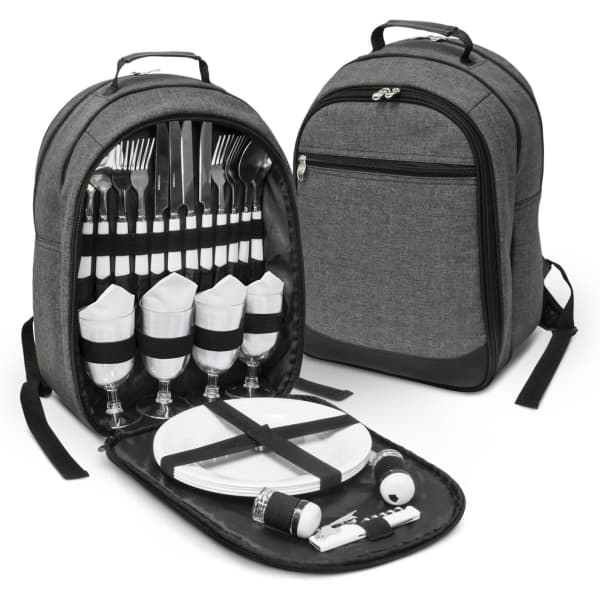 A grey picnic backpack with cutlery, wine glasses, and plates neatly organized inside. It features a logo on the exterior.