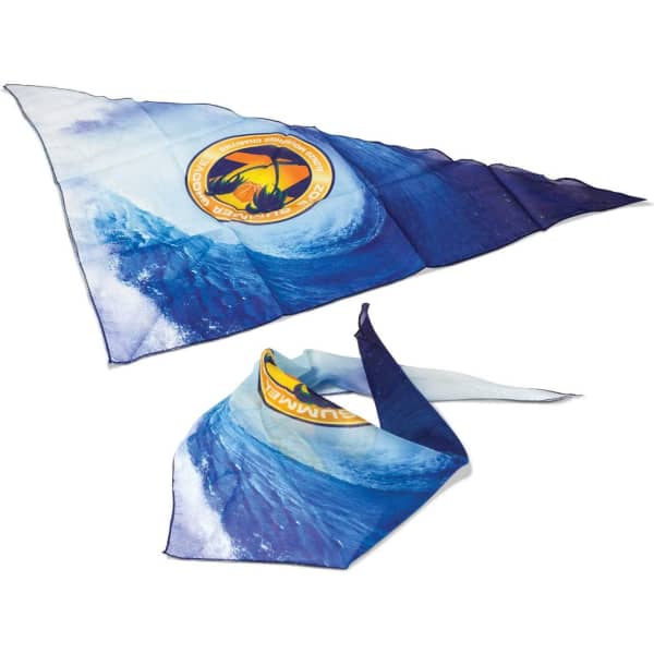 A triangular bandana in blue with a wave design and a logo on it.