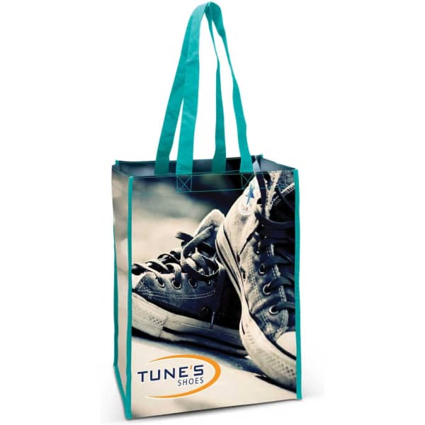 A cotton tote bag featuring a vibrant teal design and an image of sneakers, with a logo on one side.