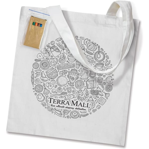A white tote bag featuring a circular design of various items and a pocket holding colourful pencils.