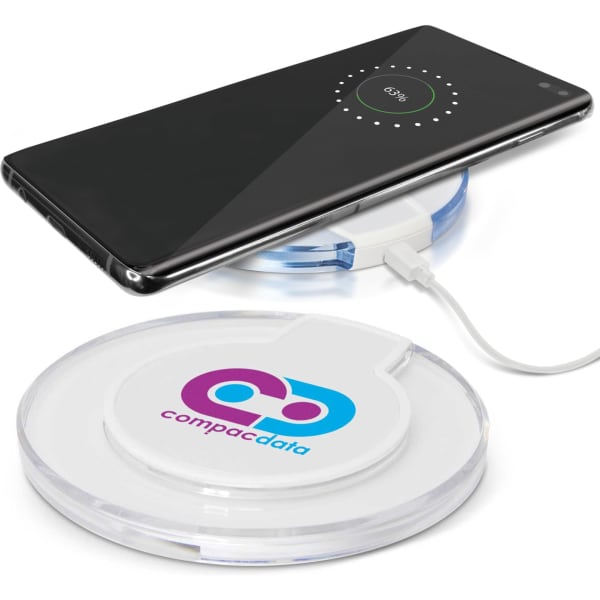 A wireless charger in clear casing with a smartphone placed on top, featuring a logo on one side.