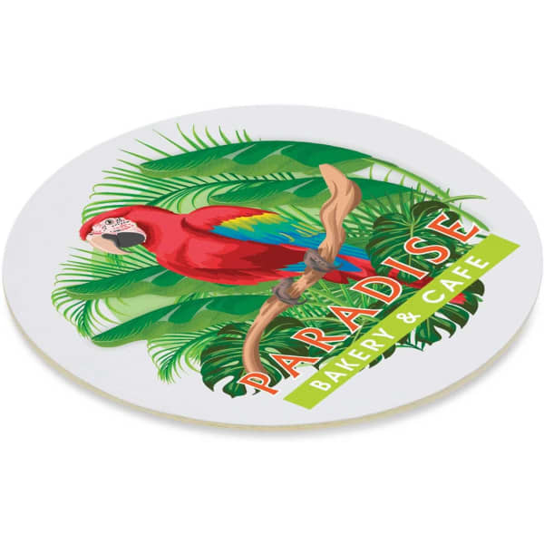 A round cardboard drink coaster featuring a colourful parrot and green foliage with a logo.