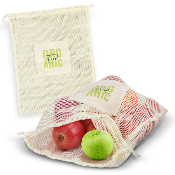 A cotton produce bag in natural colour, filled with red and green apples, featuring a logo on the front.