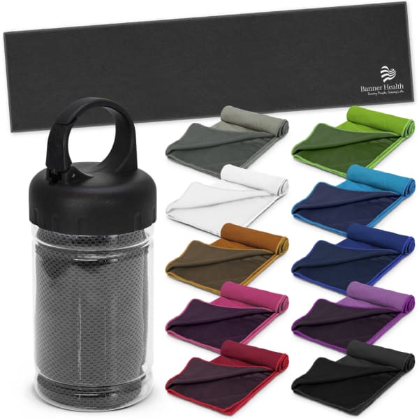 A black tube containing a cooling towel, surrounded by various coloured towels in shades of green, blue, purple, and more.