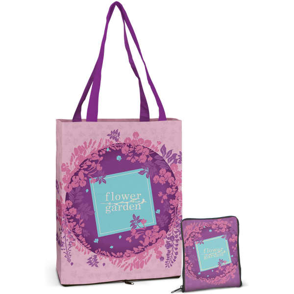 A pink tote bag featuring floral designs and purple accents, with a matched compact pouch beside it.