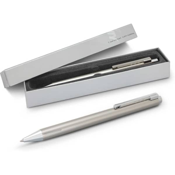 A metal pen in silver colour, displayed in an open box with a black lining. The box has a simple design.