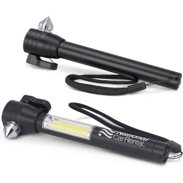 A black vehicle safety tool featuring a spike and a light, with a strap for easy carrying and a logo present.