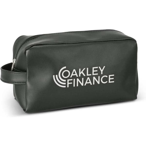 A green toiletry bag with a zip closure and a handle, featuring a logo on the side.
