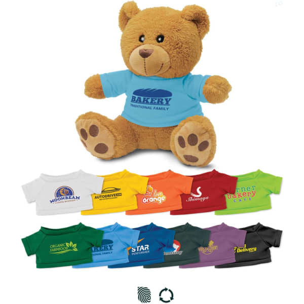 A brown teddy bear plush toy wearing a light blue shirt, accompanied by various other shirt options in different colours.