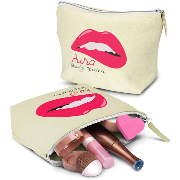A medium cosmetic bag in light yellow, featuring a graphic of lips, filled with various makeup products.