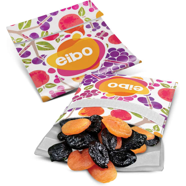 Two colourful Karma Reusable Food Pouches with a variety of dried fruits spilling out, featuring a logo.