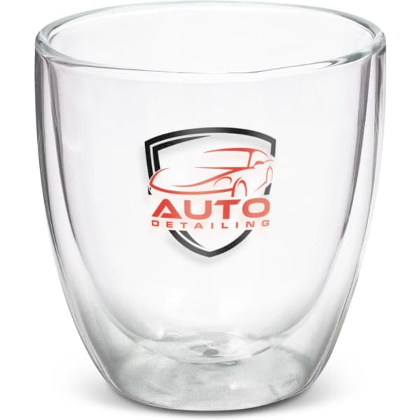 A double wall glass with a transparent design, featuring a logo and a modern shape. Holds 310ml.