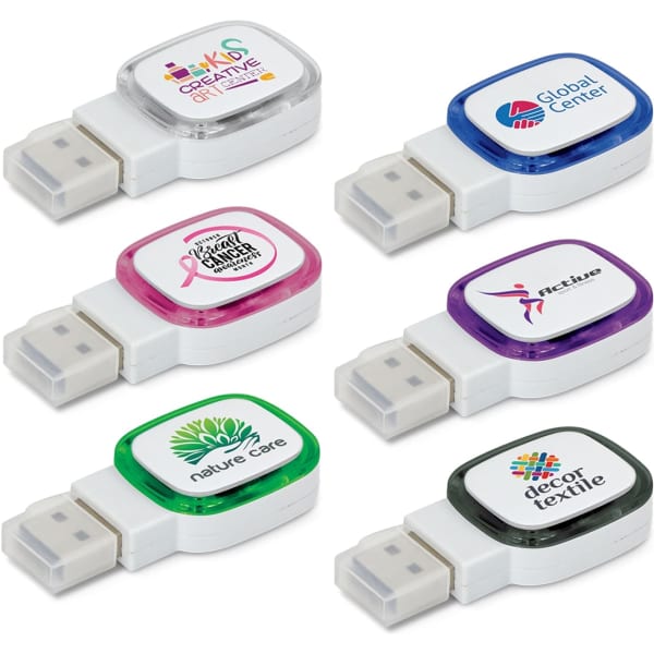 A collection of six colourful 4GB flash drives in various shapes with branding on each.