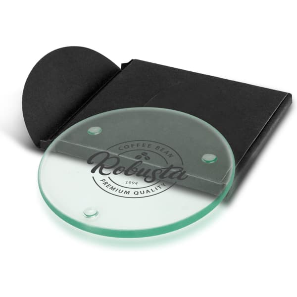 A round glass coaster in green, packaged with a black folder, featuring a logo design.