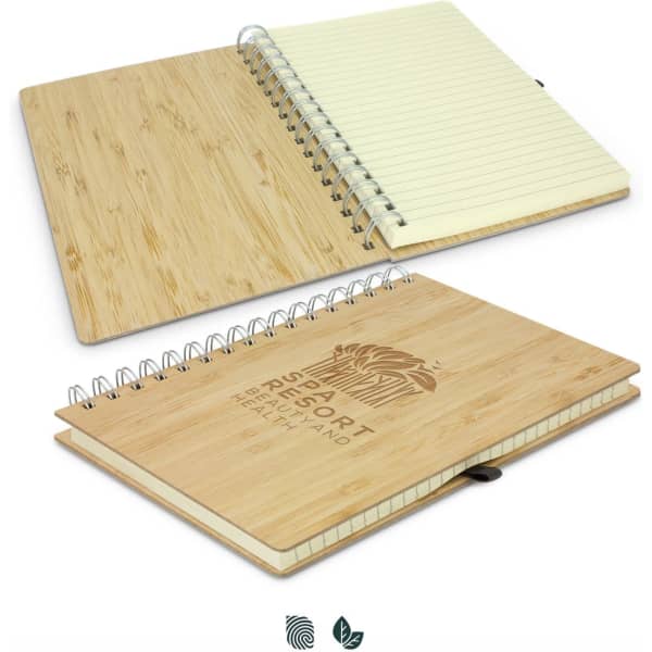 A bamboo notebook with a spiral binding, featuring a natural wood finish and lined pages inside.