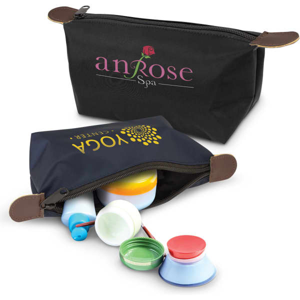 A black toiletry bag with a logo, featuring various colourful containers and products inside.