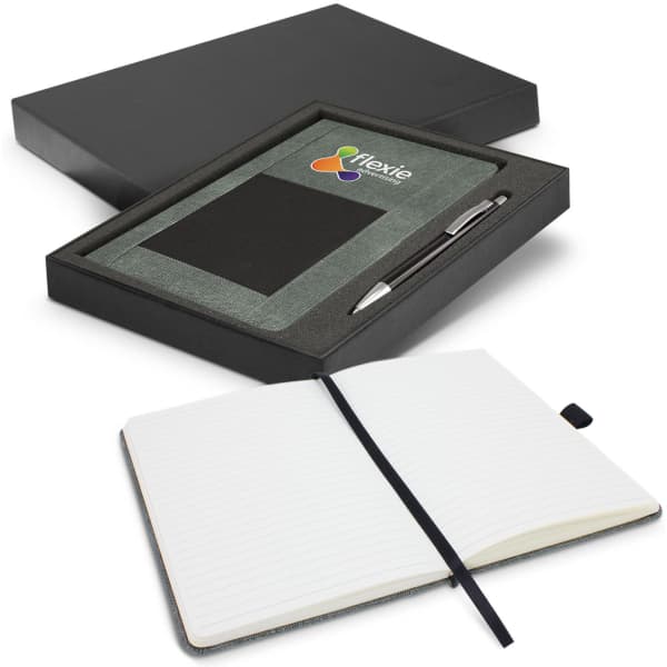 A grey notebook and silver pen gift set, presented in a black gift box with an open notebook inside.