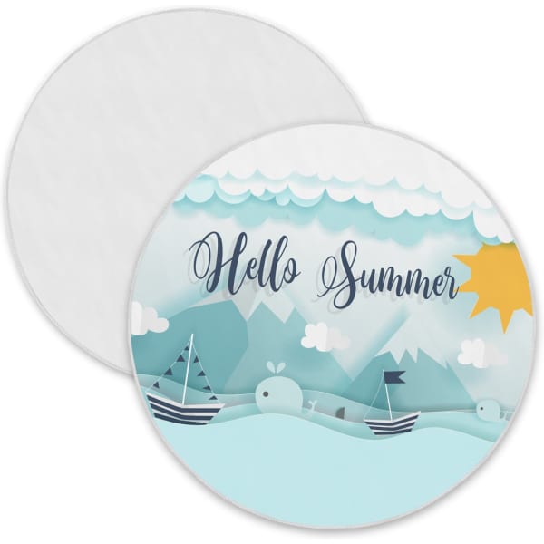 A round beach towel featuring a blue and white nautical design with a sun, clouds, and boats. It has a logo.