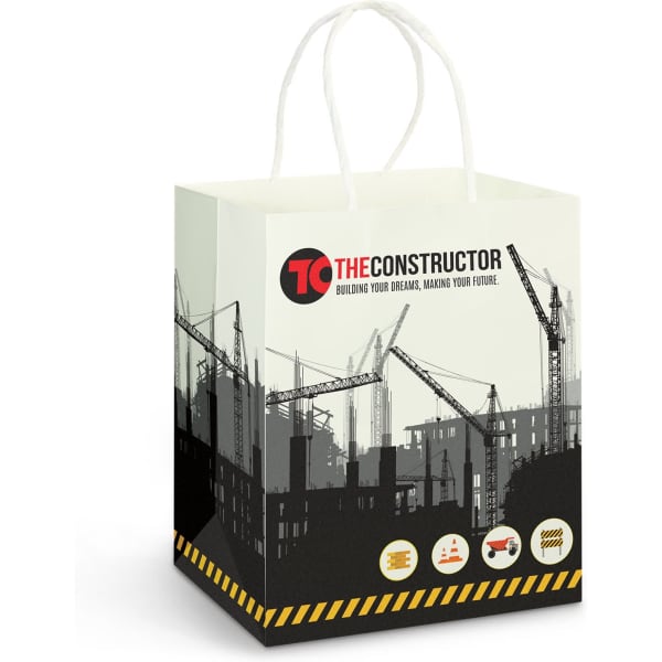 A medium-sized paper carry bag in white featuring a construction theme with cranes and a logo.