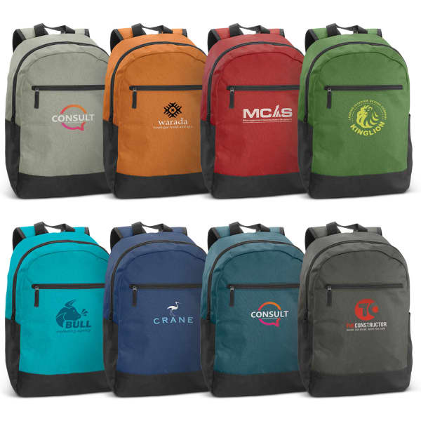 A range of Corolla Backpacks in various colours, featuring multiple logos and designs on the front pockets.