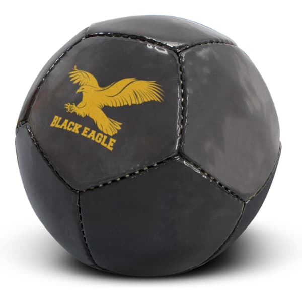 A black mini soccer ball featuring a yellow logo. The ball has classic black and white panel designs.