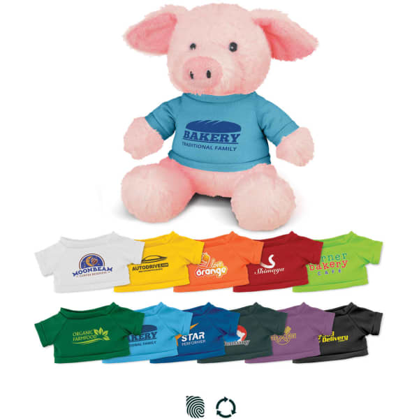 A pink plush pig toy wearing a blue shirt. Various colourful shirts are displayed below the toy, featuring different logos.