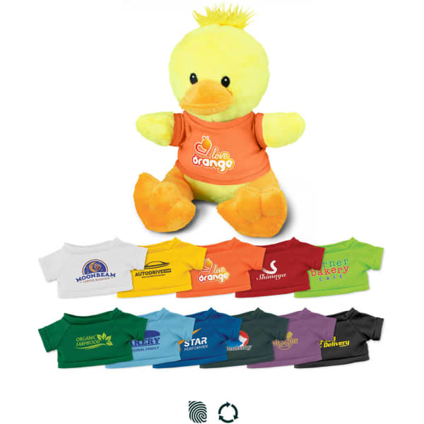 A yellow duck plush toy wearing an orange T-shirt, surrounded by various smaller T-shirts in different colours.