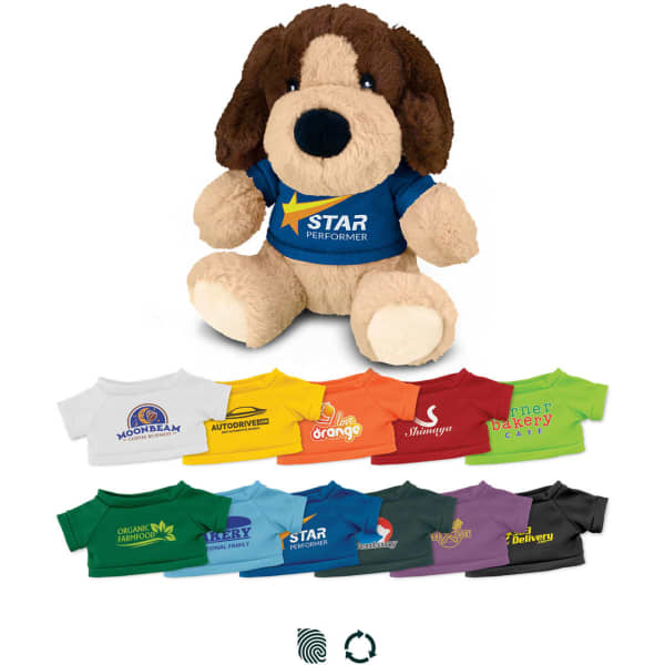 A plush dog toy with a brown head and beige body, dressed in a blue t-shirt. Several miniature t-shirts in various colours below.